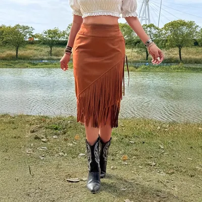 Falda A moderna de color sólido asimétrica con dobladillo de borlas para mujer, estilo informal