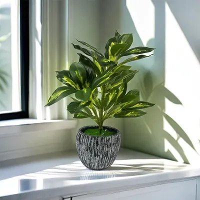 Konstgjord grön planta monstera falsk blomma supermarknadskänsla