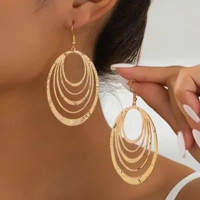Pendientes de mujer elegantes de metal multicapa con huecos de círculo, de moda europea y americana