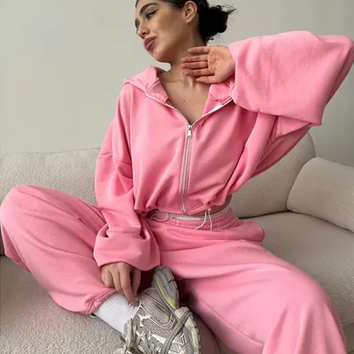 Conjunto de duas peças de mulher: sweatshirt de manga comprida com fecho e calças de sweat de cor lisa