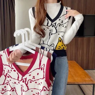 Mode kattväst, vår och höst ny koreansk stil pullover V-hals, liten nischad design, sleeveless stickad topp för kvinnor
