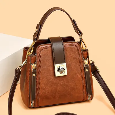 Bolso de mano de cuero suave de textura retro fácil de combinar para mujer, bolso de hombro, uso bidireccional