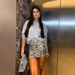 Saia A-line sexy de estilo europeu e americano, cintura alta, com lantejoulas na anca
