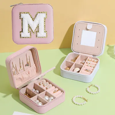 Portabel smyckesring förvaringslåda för örhängen, studs och halsband