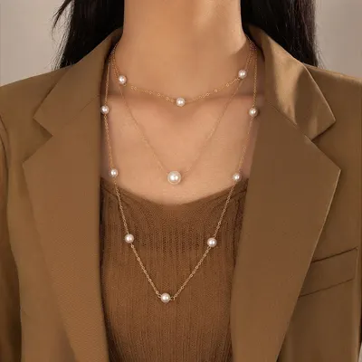 Colar longo de pérolas novo de cross-border europeu e americano, colar de gola de suéter em camadas fashion, colar fashion de luxo discreto