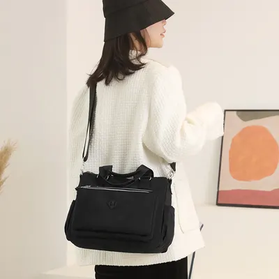 Bolsa de ombro nova e moderna para mulheres Duo Cai Hu, mochila de nylon resistente à água multicamadas, bolsa transversal casual esportiva