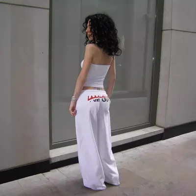 مجموعة أنابيب علوية وسراويل واسعة الساقين بتصميم لوني تصادمي بأسلوب الرجل العصري الساخن والترو