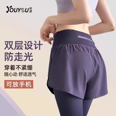 Kvinnors yoga-byxor med faux tvådelad design