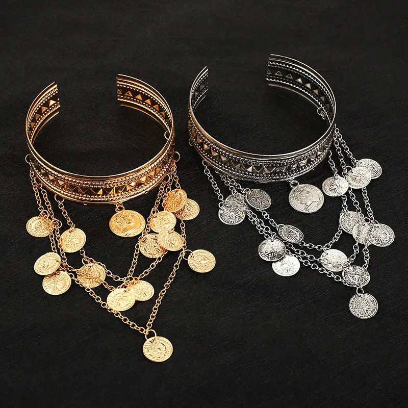 Braçadeira com moeda de metal e borlas, estilo jeans