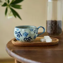 Taza de café de gres hecha a mano con dibujo azul y blanco de flores, taza Haha