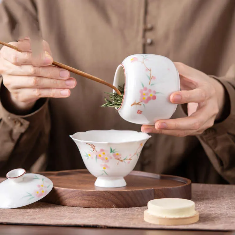 Jardinha de chá pequena de porcelana com pintura manual de flor de pêssego, selo de subcozedura