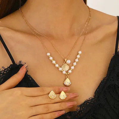 Halsband med snäckskal, strass och pärlor, smycke