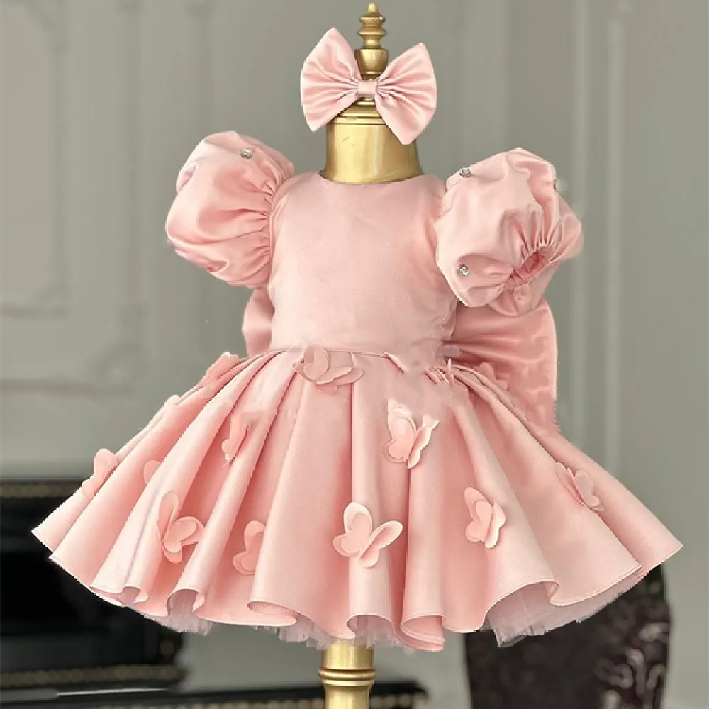 Vestido de princesa infantil con mangas abullonadas y lazo