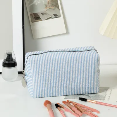 Bolsa de maquilhagem com fios de lã bicolor, riscada, personalizada, bordada