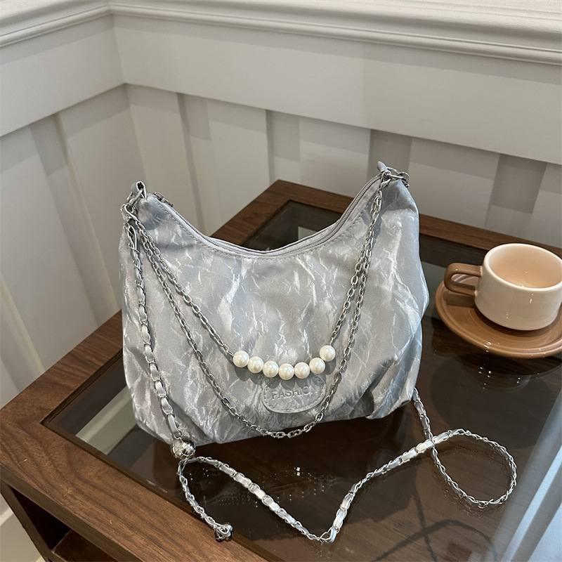 New autumn large capacity niche versatile high-end armpit design chain shoulder messenger bag