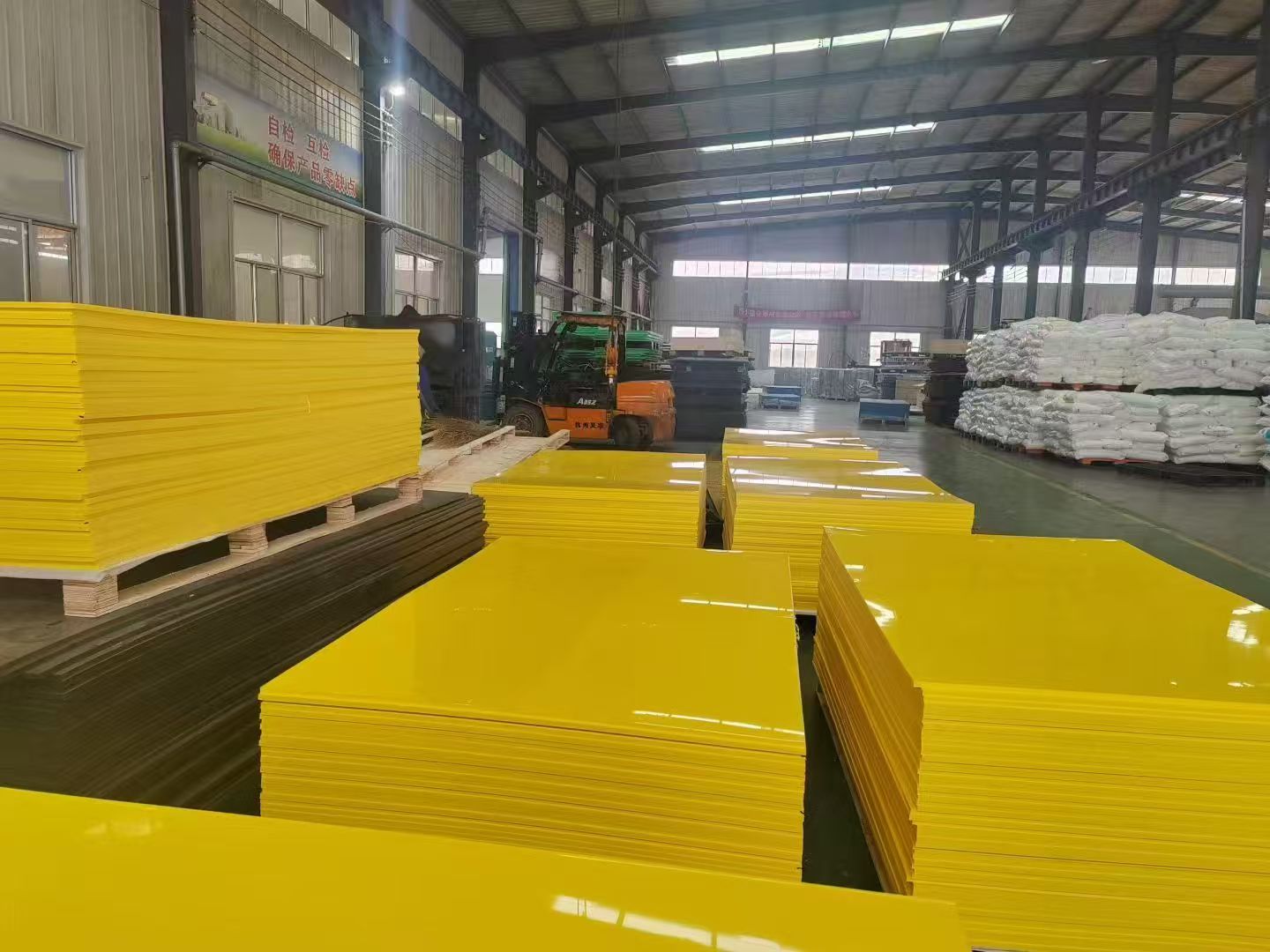 Ultra-high molecular weight polyethylene sheets.